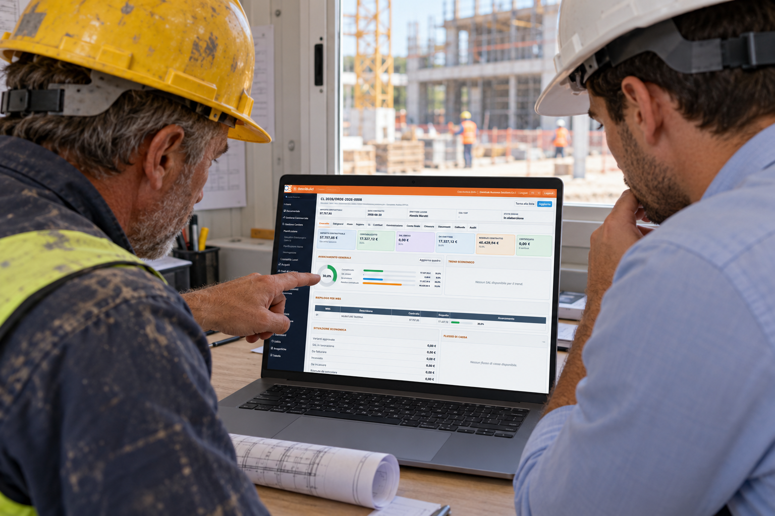 Capocantiere e tecnico consultano l’avanzamento della commessa in OmniBuild